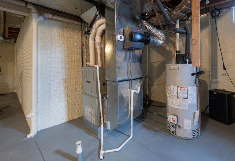 home has been updated with a new residential furnace and hot water tank installed in the basement