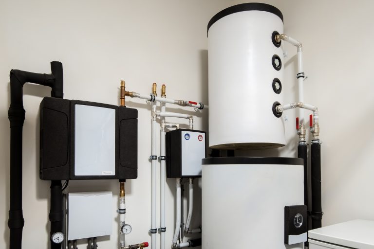 Modern sustainable heat pump installation for heating water and houses