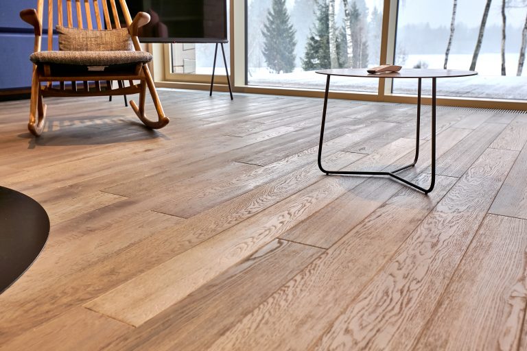 Close-up of natural wood parquet floor in living room